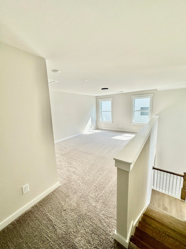 empty room featuring carpet flooring