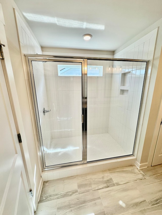 bathroom with an enclosed shower