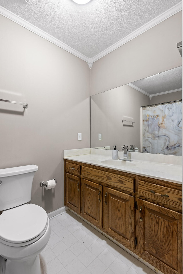 bathroom featuring tile patterned floors, crown molding, a textured ceiling, toilet, and vanity