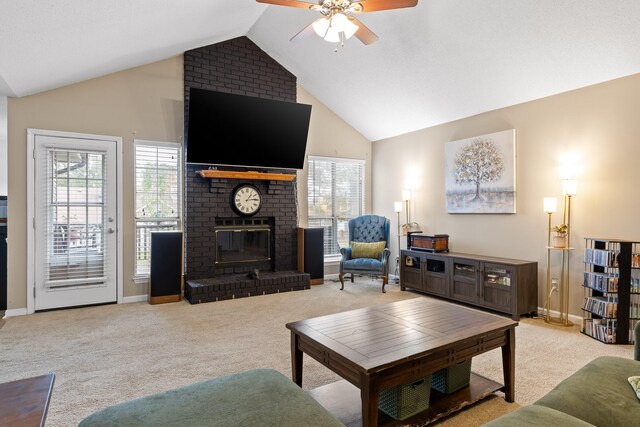 living room featuring light carpet, a brick fireplace, vaulted ceiling, and ceiling fan