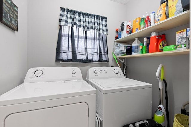 clothes washing area featuring washing machine and dryer