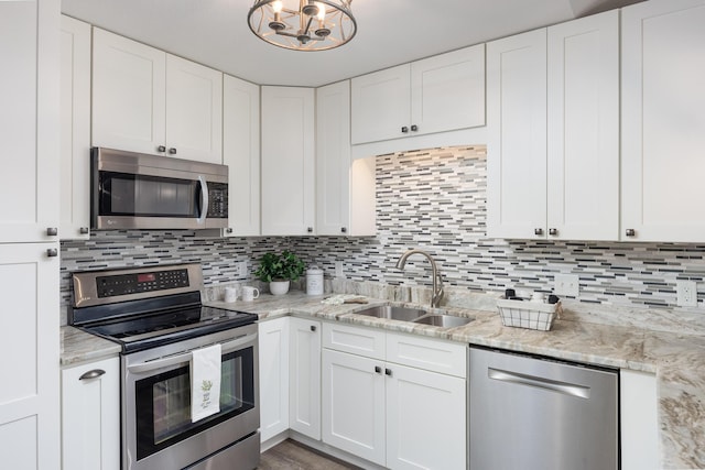 kitchen with white cabinets and stainless steel appliances