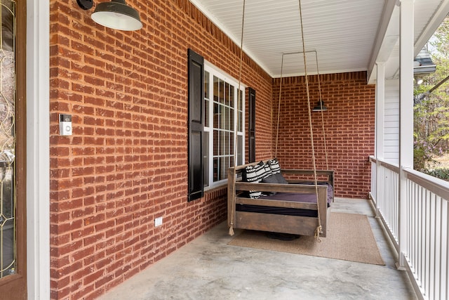 balcony featuring a porch