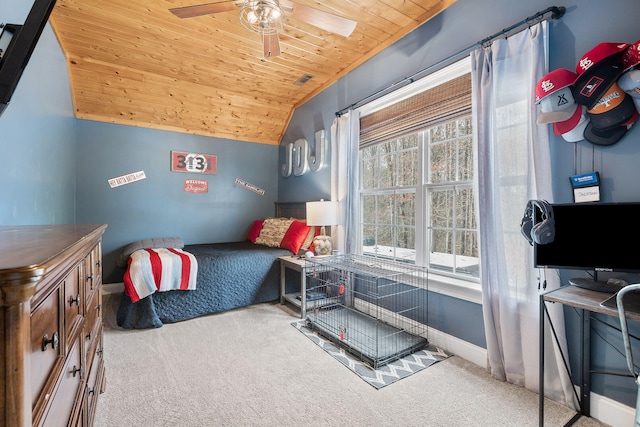 bedroom featuring ceiling fan, light carpet, lofted ceiling, and wood ceiling