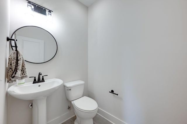 11330 Cape Vw Unit 33, Soddy Daisy, TN 37379 - half bath with baseboards, toilet, and tile patterned floors
