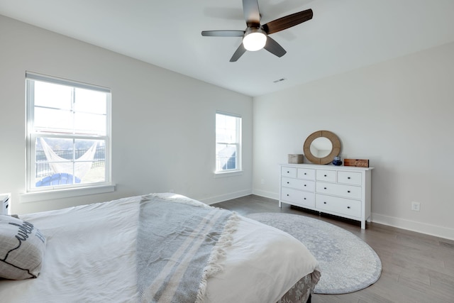11330 Cape Vw Unit 33, Soddy Daisy, TN 37379 - bedroom featuring wood finished floors, baseboards, and a ceiling fan