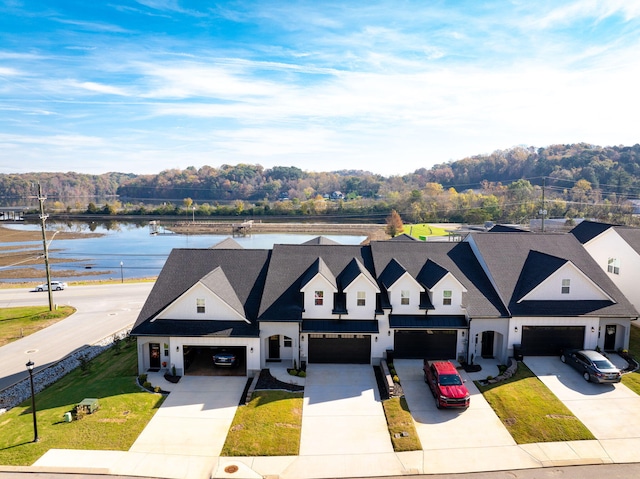 view of front of home featuring a water view