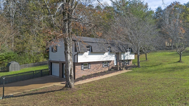 view of property exterior featuring a lawn, a shed, and a garage