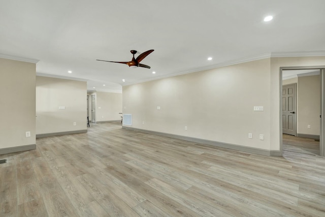 unfurnished living room featuring ceiling fan, light hardwood / wood-style floors, and ornamental molding