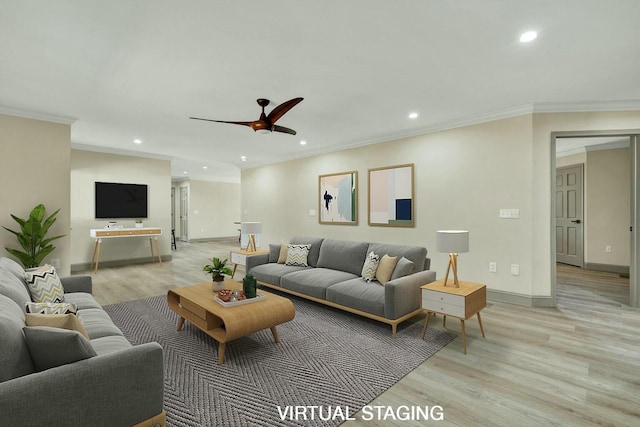 living room with light hardwood / wood-style flooring, ceiling fan, and crown molding