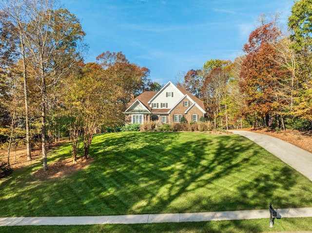 view of front of home featuring a front lawn