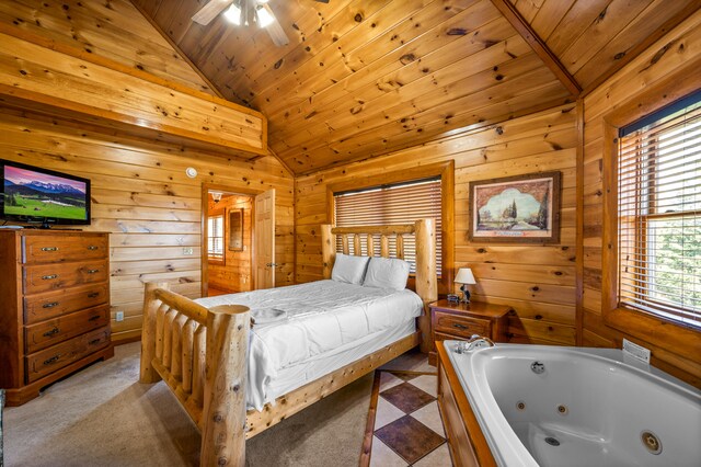 bedroom with ceiling fan, light colored carpet, wood ceiling, and vaulted ceiling