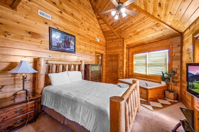 bedroom featuring ceiling fan, wooden ceiling, wooden walls, high vaulted ceiling, and light carpet