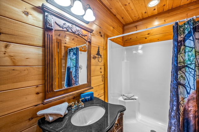 bathroom featuring wood walls, vanity, wood ceiling, and a shower with shower curtain