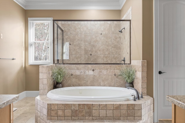 bathroom featuring plus walk in shower, vanity, tile patterned floors, and crown molding