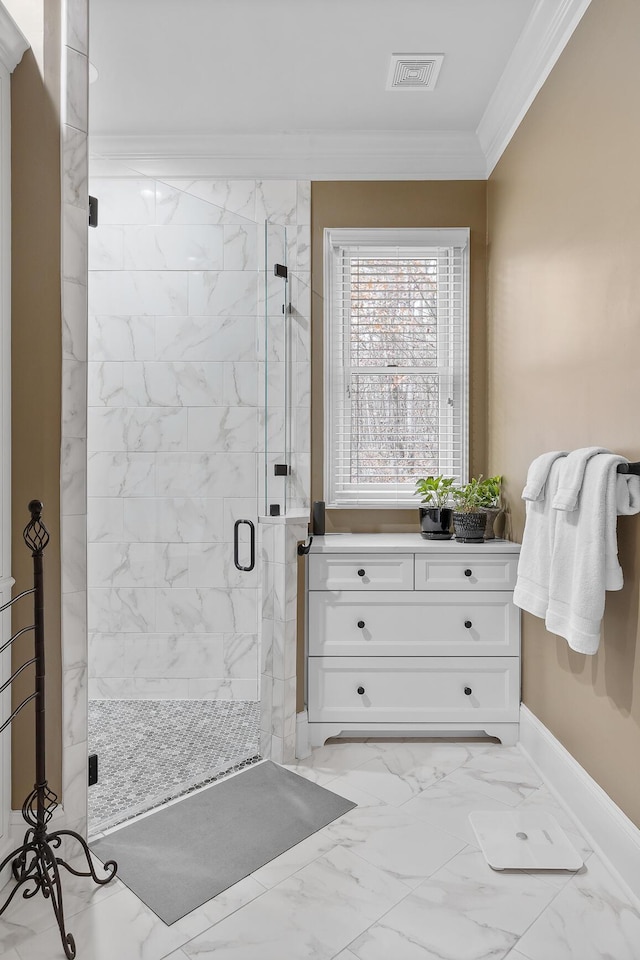 bathroom with walk in shower and ornamental molding