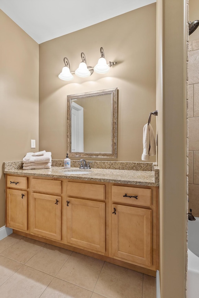 bathroom with vanity and tile patterned floors