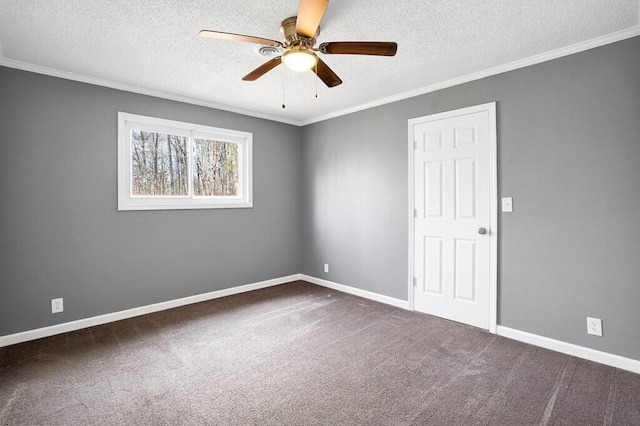 empty room with ceiling fan, dark carpet, and a textured ceiling