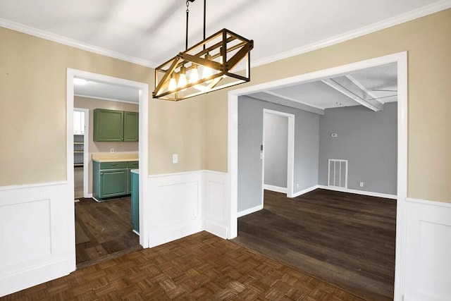 unfurnished dining area featuring ornamental molding