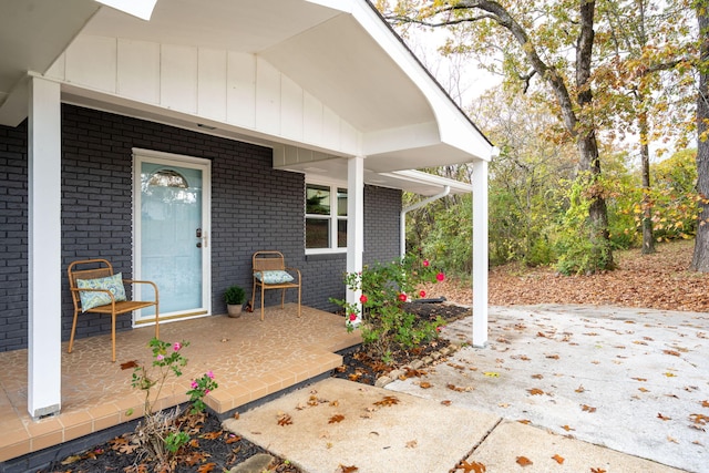 doorway to property with a porch