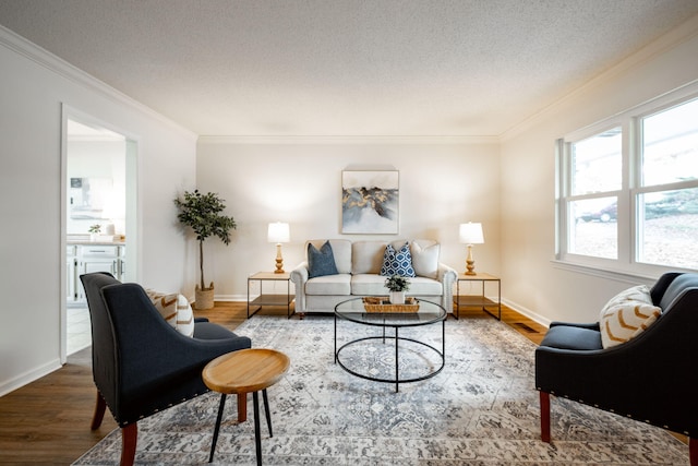 9100 Coventry Ln, Chattanooga, TN 37416 - living room featuring crown molding, a textured ceiling, wood finished floors, and baseboards