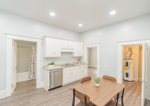 kitchen featuring water heater, dishwasher, white cabinetry, light countertops, and light wood-style floors