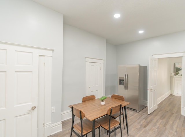 dining area featuring light hardwood / wood-style floors