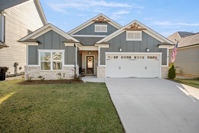 craftsman inspired home with a garage and a front lawn