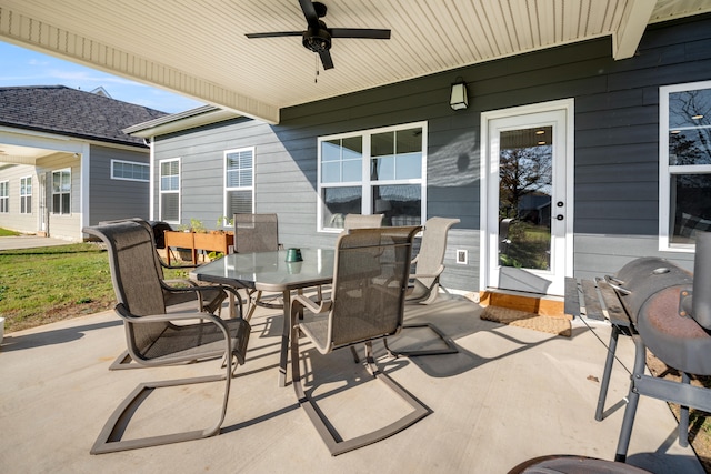 view of patio featuring ceiling fan