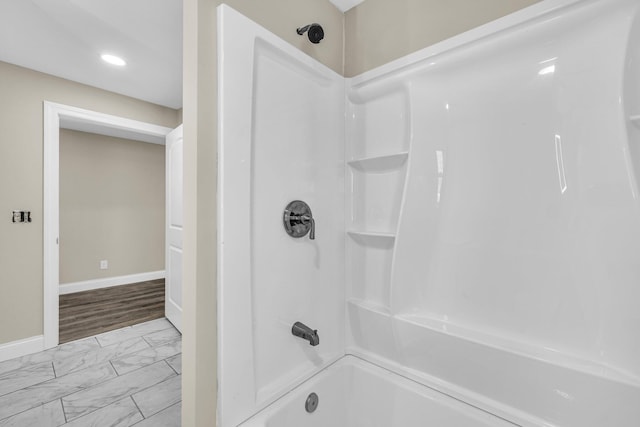 bathroom featuring tub / shower combination