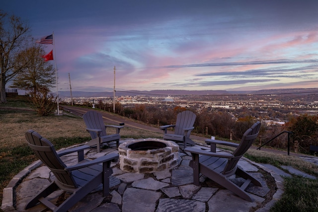 patio terrace at dusk with an outdoor fire pit