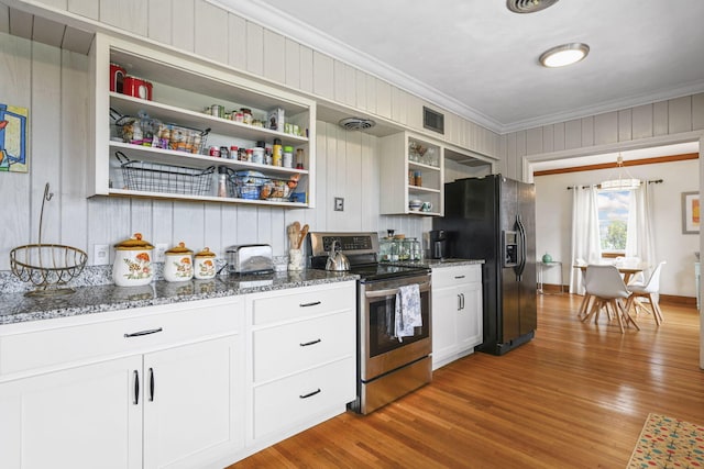 kitchen with black refrigerator with ice dispenser, stainless steel range with electric stovetop, crown molding, dark hardwood / wood-style floors, and white cabinetry