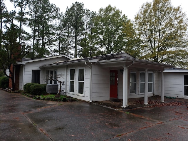 view of front facade with cooling unit