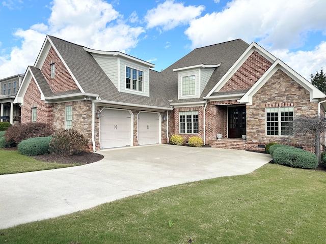 view of front of home featuring a garage and a front yard