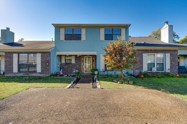 front of property featuring a front lawn