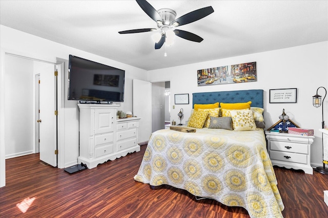 bedroom featuring ceiling fan and dark wood-type flooring