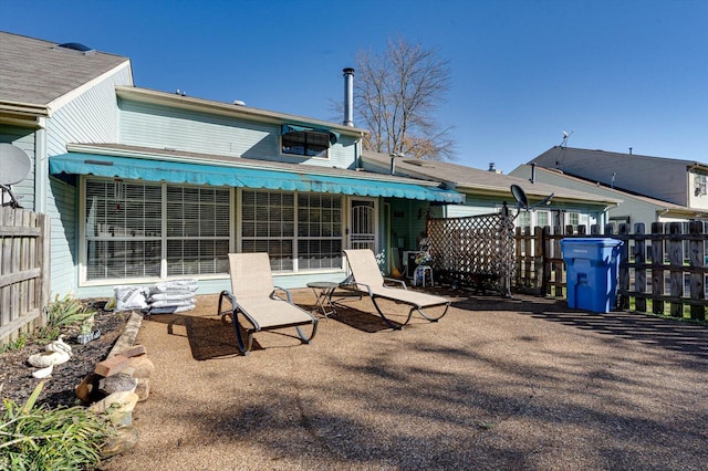 back of property with a patio area