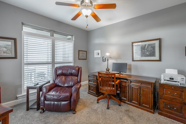 office area with light carpet and ceiling fan