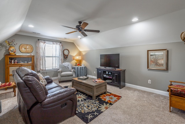 living room featuring light carpet, ceiling fan, and lofted ceiling