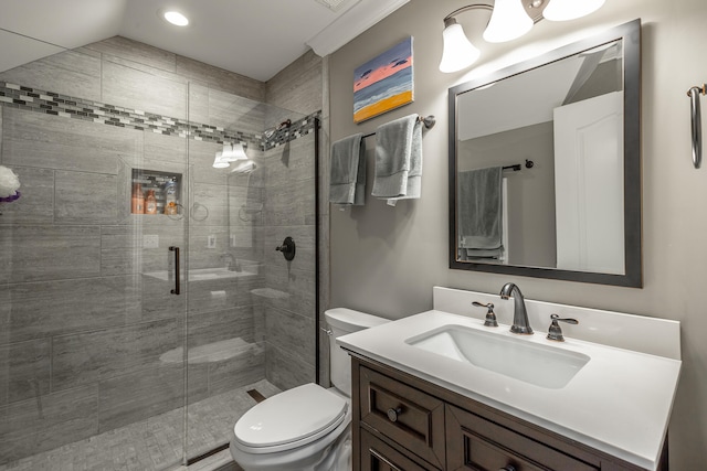 bathroom with vanity, toilet, walk in shower, and lofted ceiling