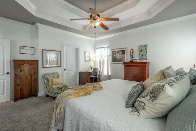 bedroom with ceiling fan, a raised ceiling, and crown molding