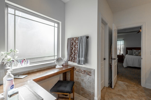 bathroom featuring tile patterned floors and plenty of natural light