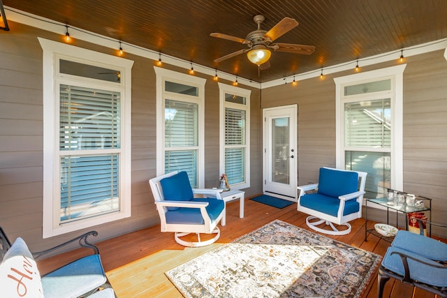 wooden terrace with ceiling fan