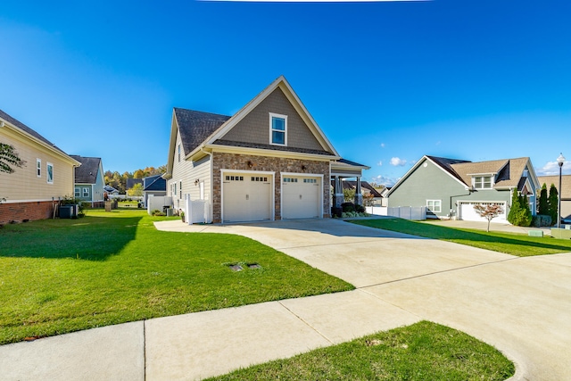 view of front of house with a front lawn and a garage