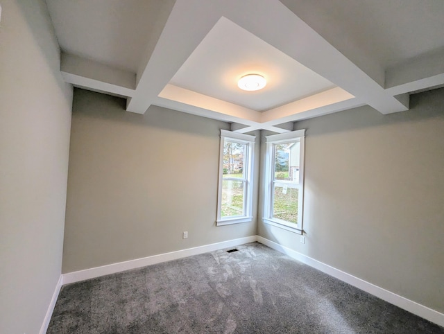 carpeted empty room with beamed ceiling and coffered ceiling