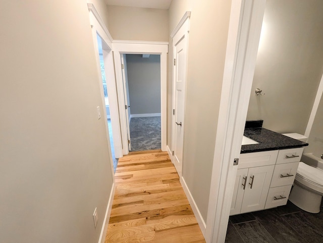 hallway featuring light hardwood / wood-style flooring