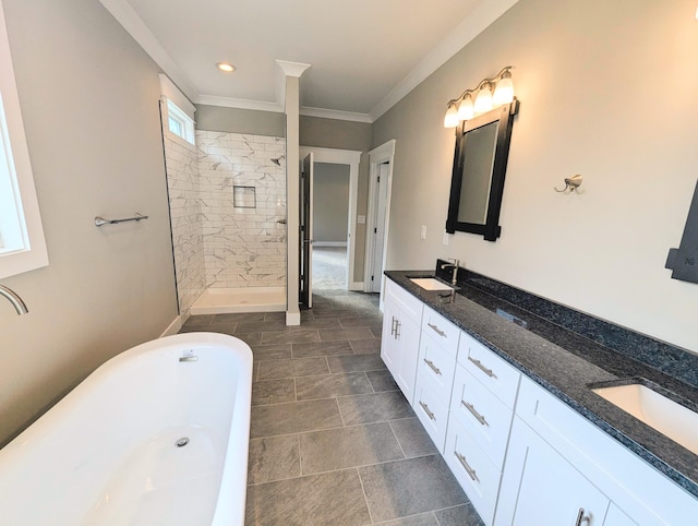 bathroom with ornamental molding, vanity, and plus walk in shower