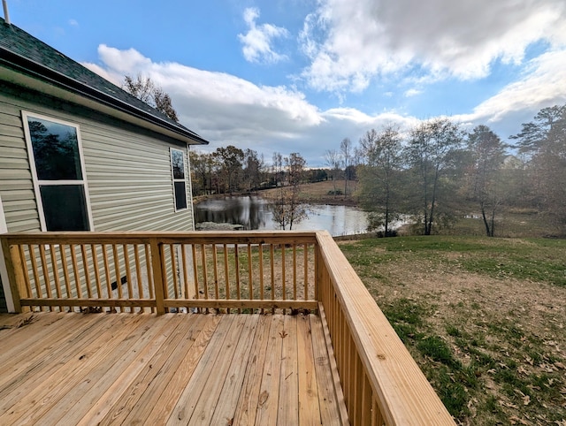 deck featuring a water view