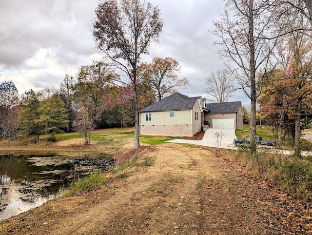 view of yard featuring a garage