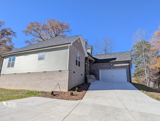 view of property exterior with a garage